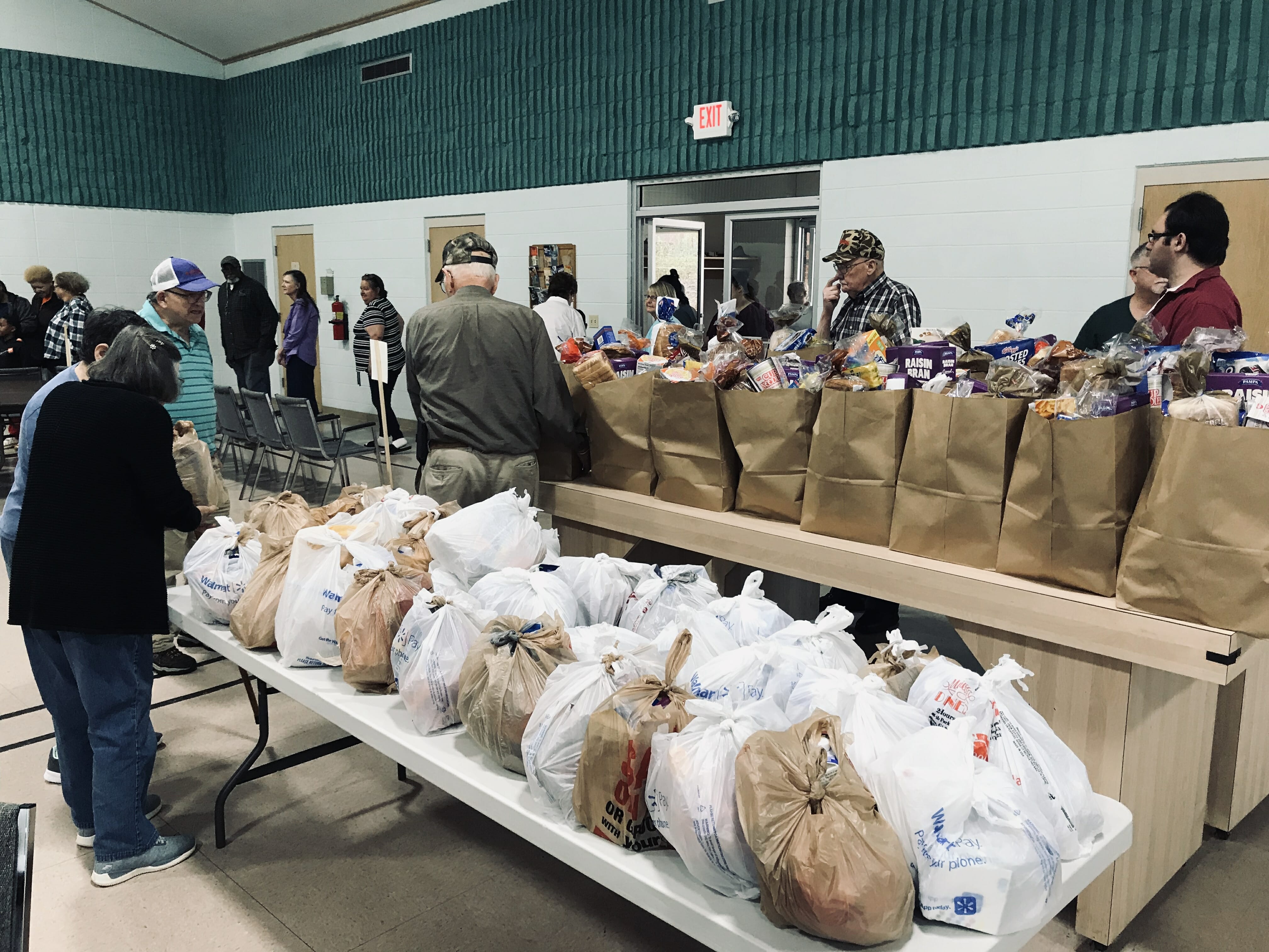 74 bags of groceries were distributed that day